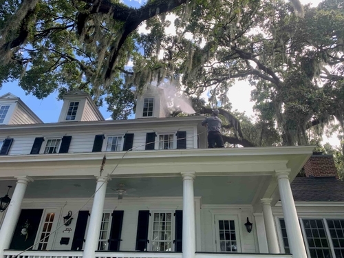 Window cleaning at a two-story Central Florida home