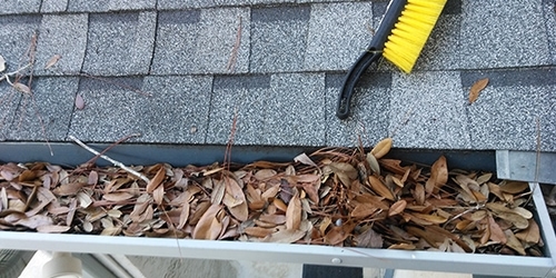 Gutter cleaning project on a Central Florida home